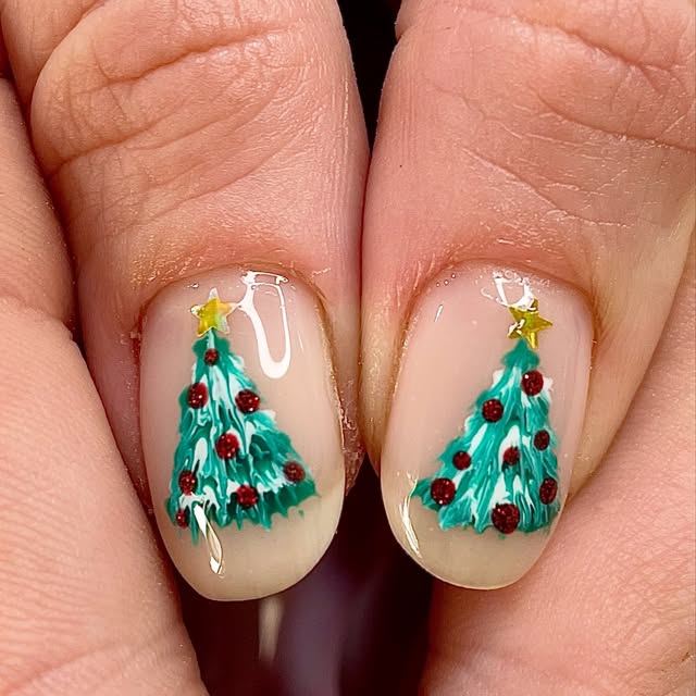 Hand painted Christmas trees on natural nails