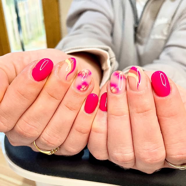 Pink and cream swirl abstract nail art