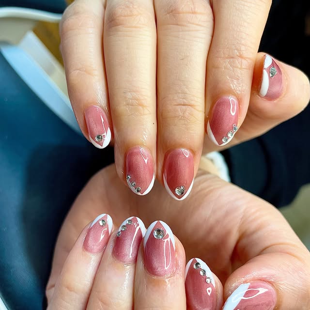 Pink and white french tip nails with crystals